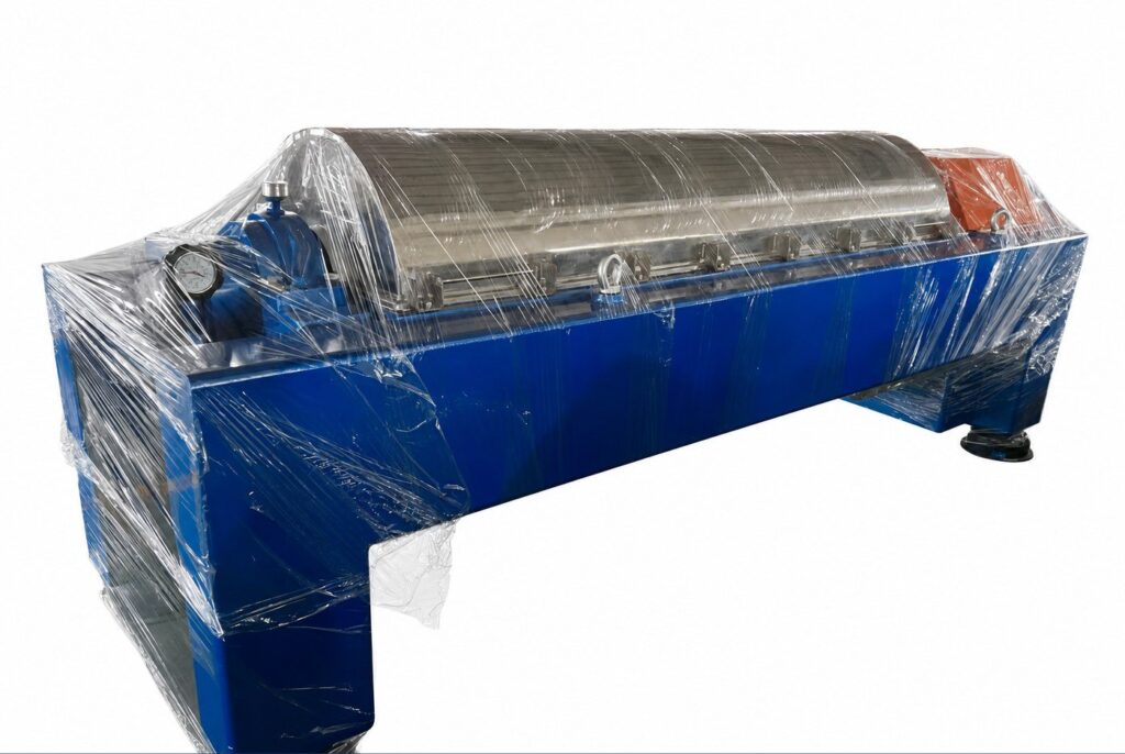 Decanter centrifuge for three-phase separation of oil, water and solids.