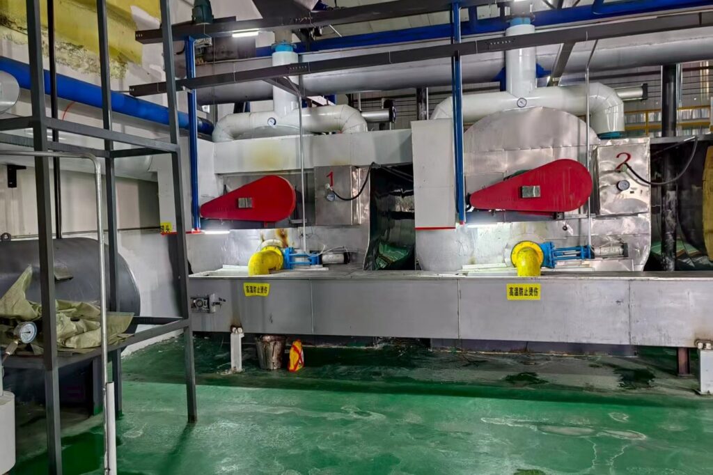Two stainless steel cookers with insulated shells